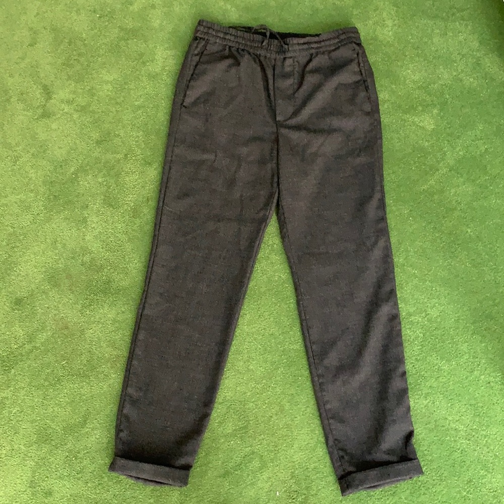 Worn once. Dress pants with a draw string